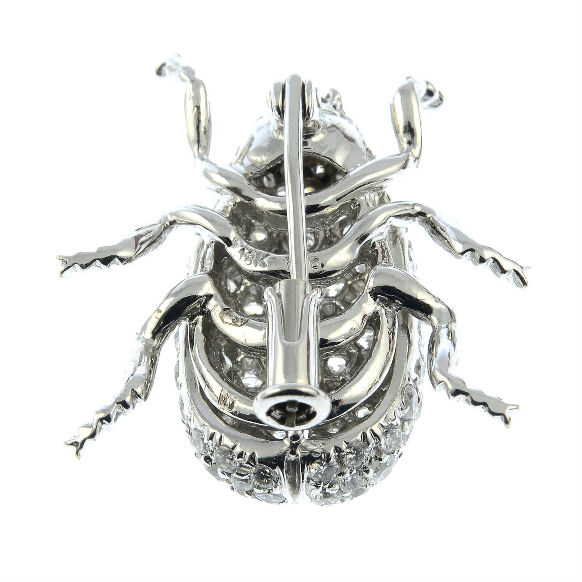 A pavé-set diamond beetle insect brooch, with ruby eyes. - Image 3 of 4