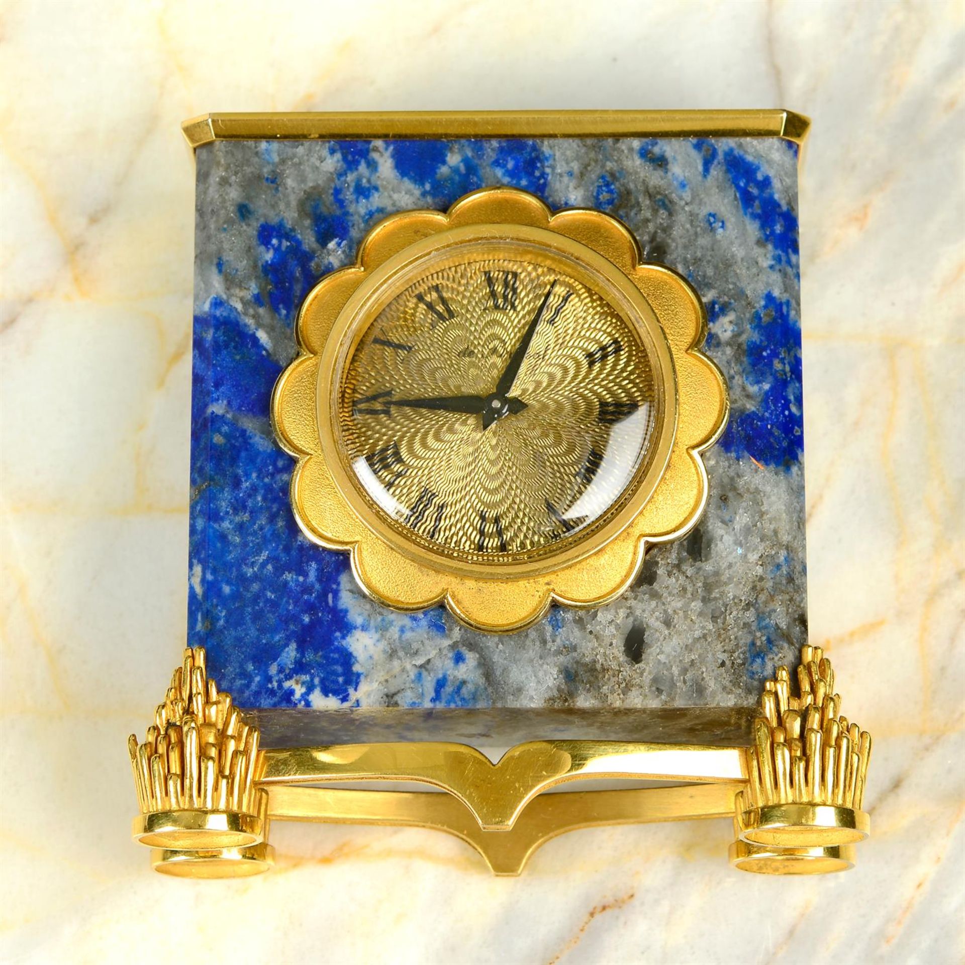 A mid 20th century 18ct gold sodalite carriage clock, in de Brysal case, for Van Cleef & Arpels.