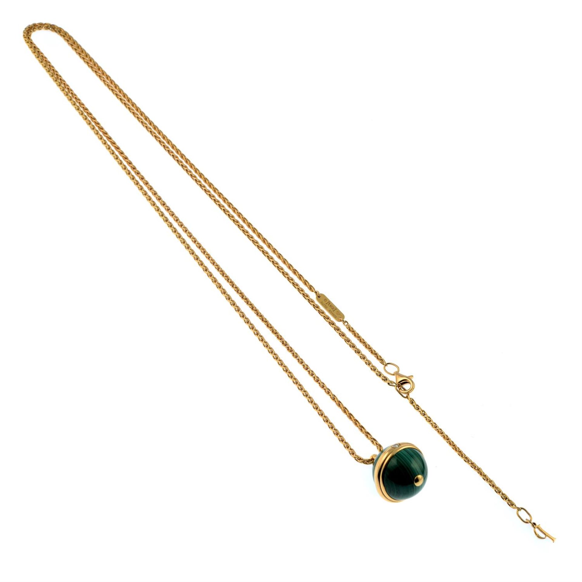 A malachite and diamond 'Posession' pendant, on chain, by Piaget. - Image 4 of 6