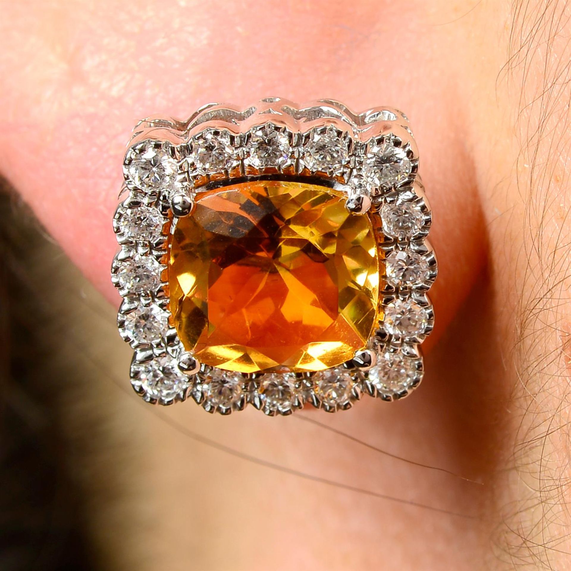 A pair of 18ct gold citrine and brilliant-cut diamond cluster earrings.
