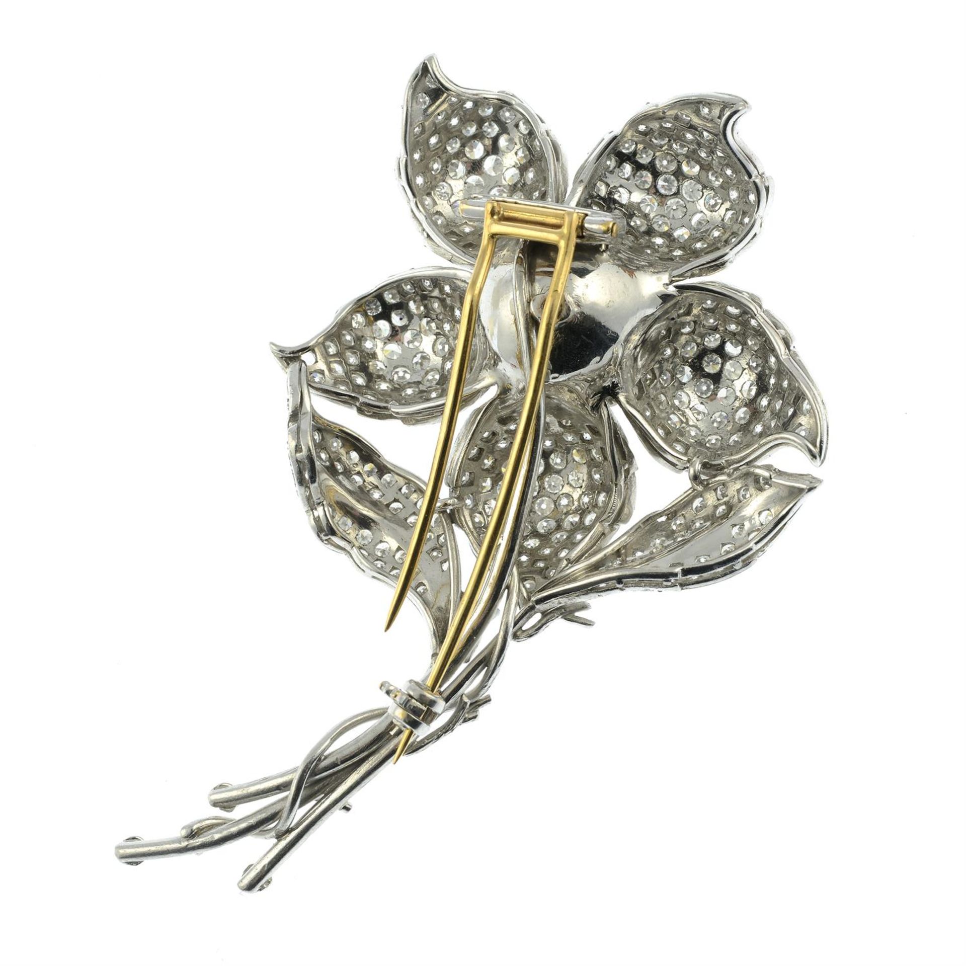 A pavé-set diamond flower brooch. - Image 3 of 4