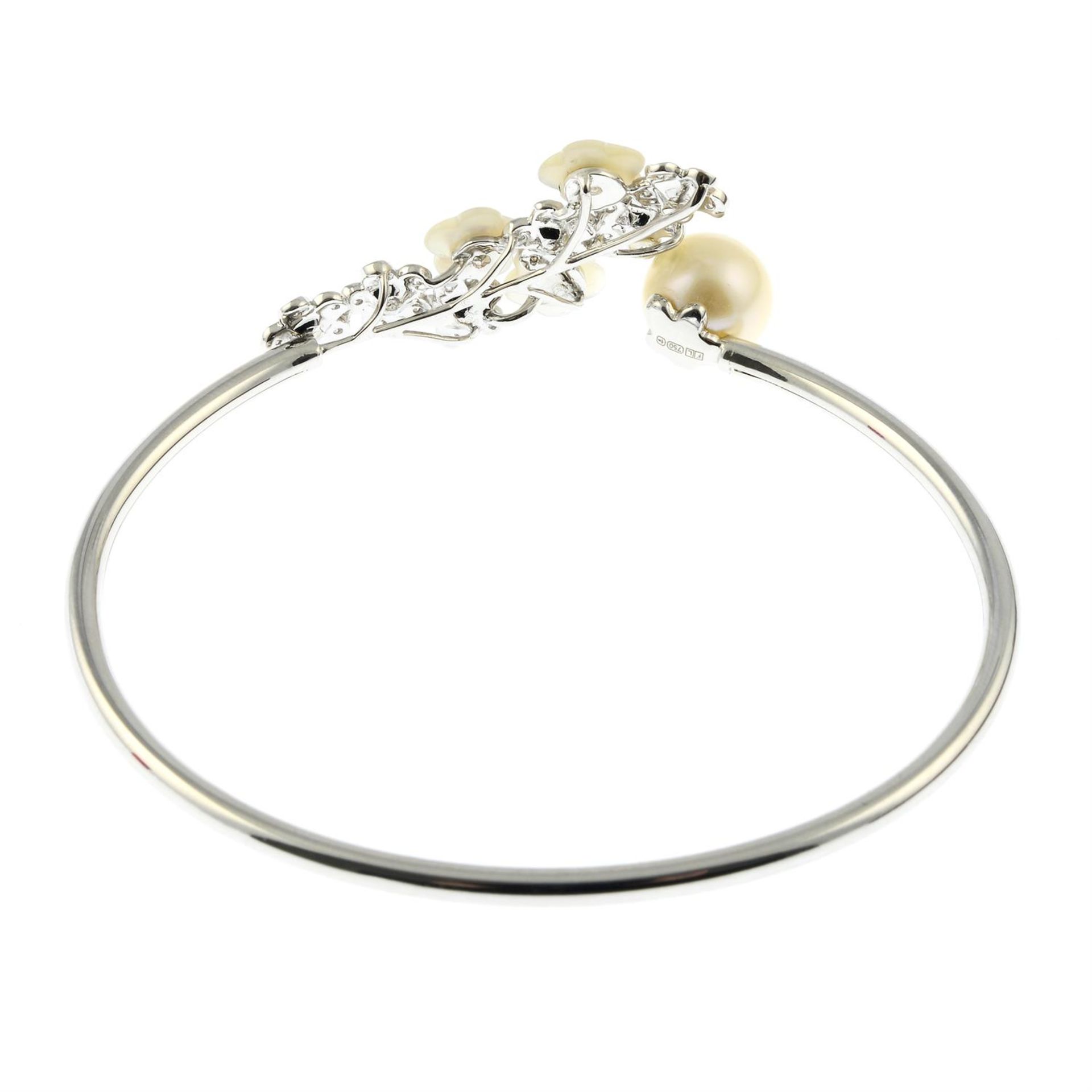 An 18ct gold diamond, mother-of-pearl and cultured pearl floral cuff bangle. - Image 3 of 3