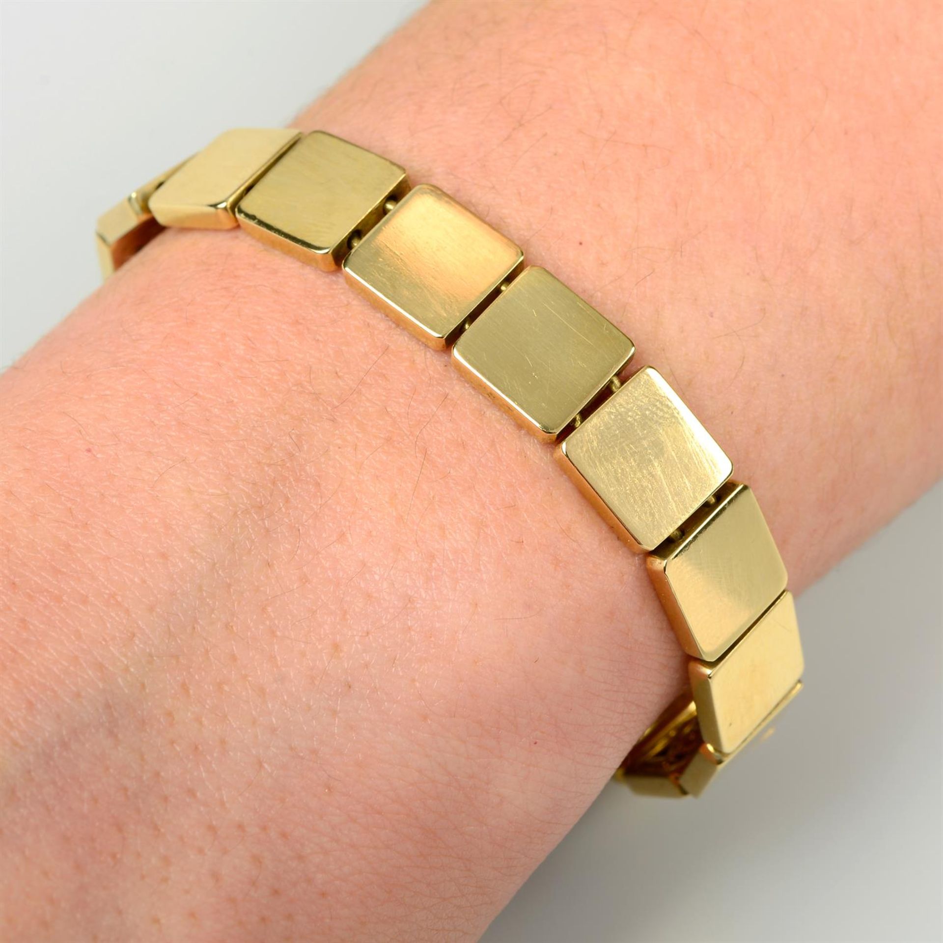 An 18ct gold square tile-link bracelet, by Tiffany and Co.