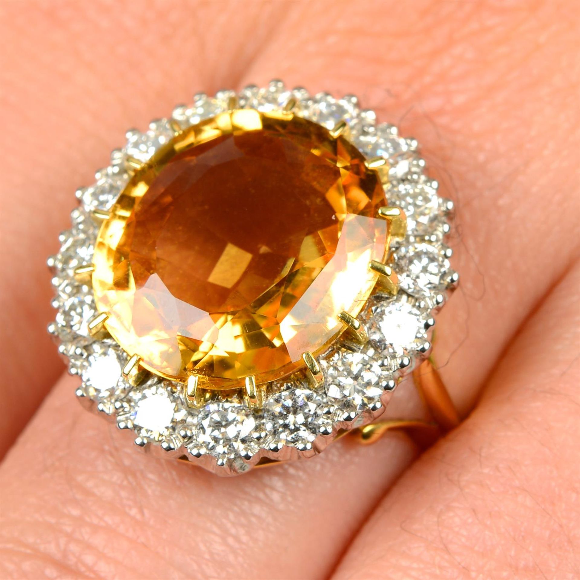 A 'golden' topaz and old-cut diamond cluster ring.