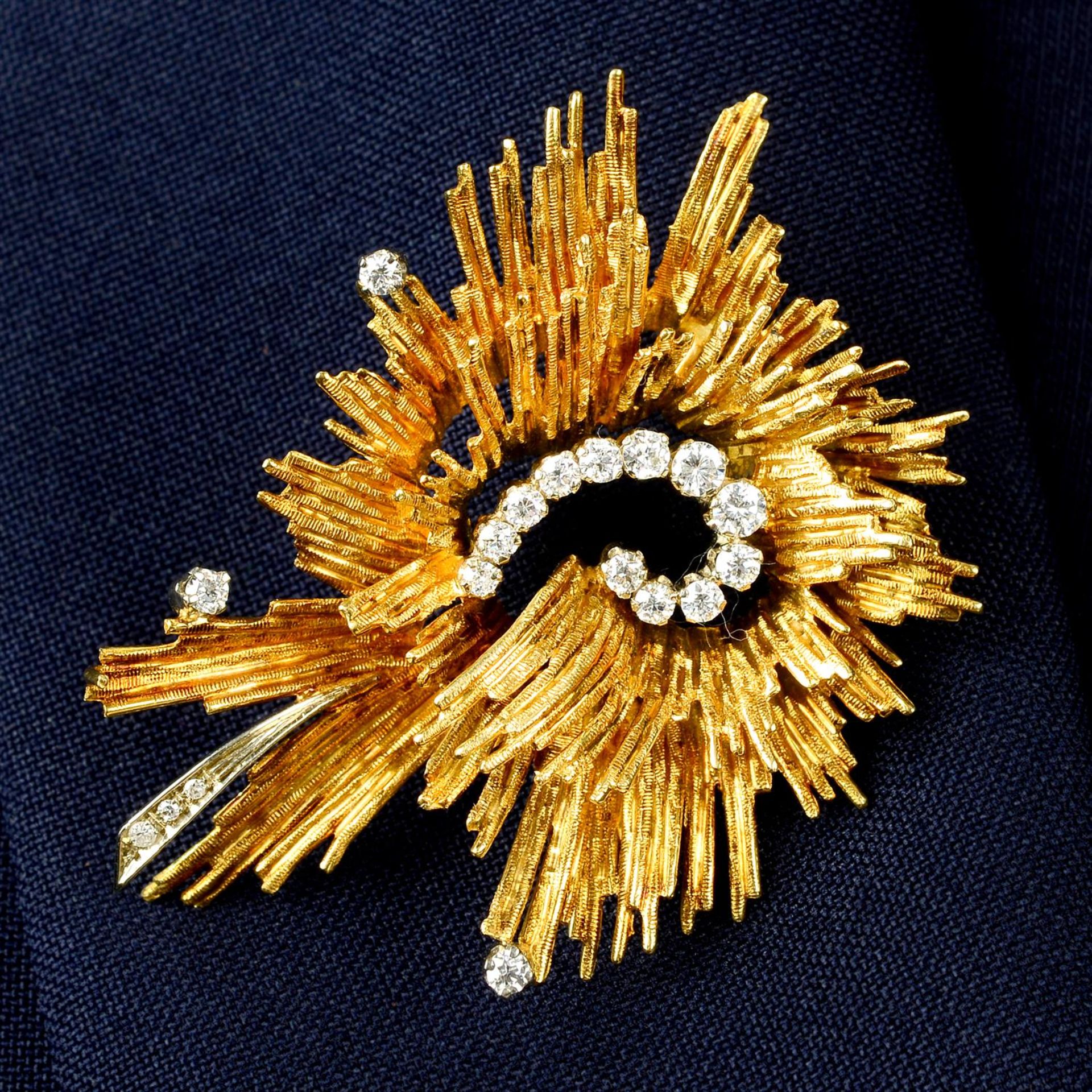 A mid 20th century 18ct gold brilliant and single-cut diamond brooch.