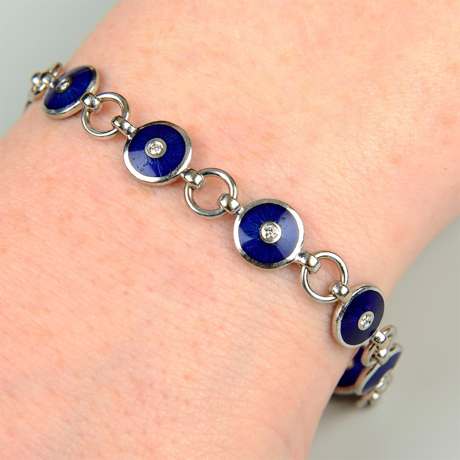 A limited edition diamond and blue enamel bracelet, by Victor Mayer for Fabergé.