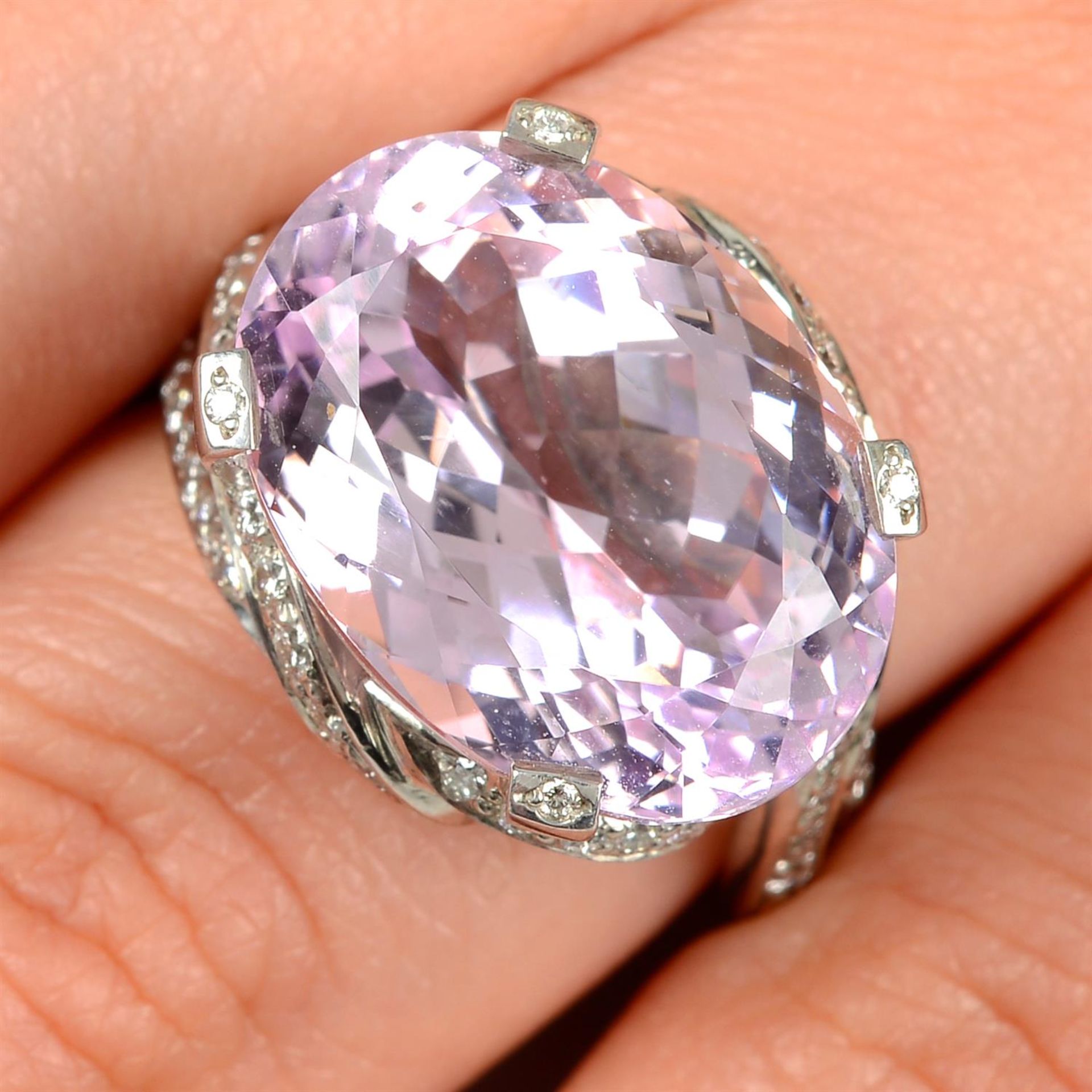 An 18ct gold kunzite and diamond cocktail ring.