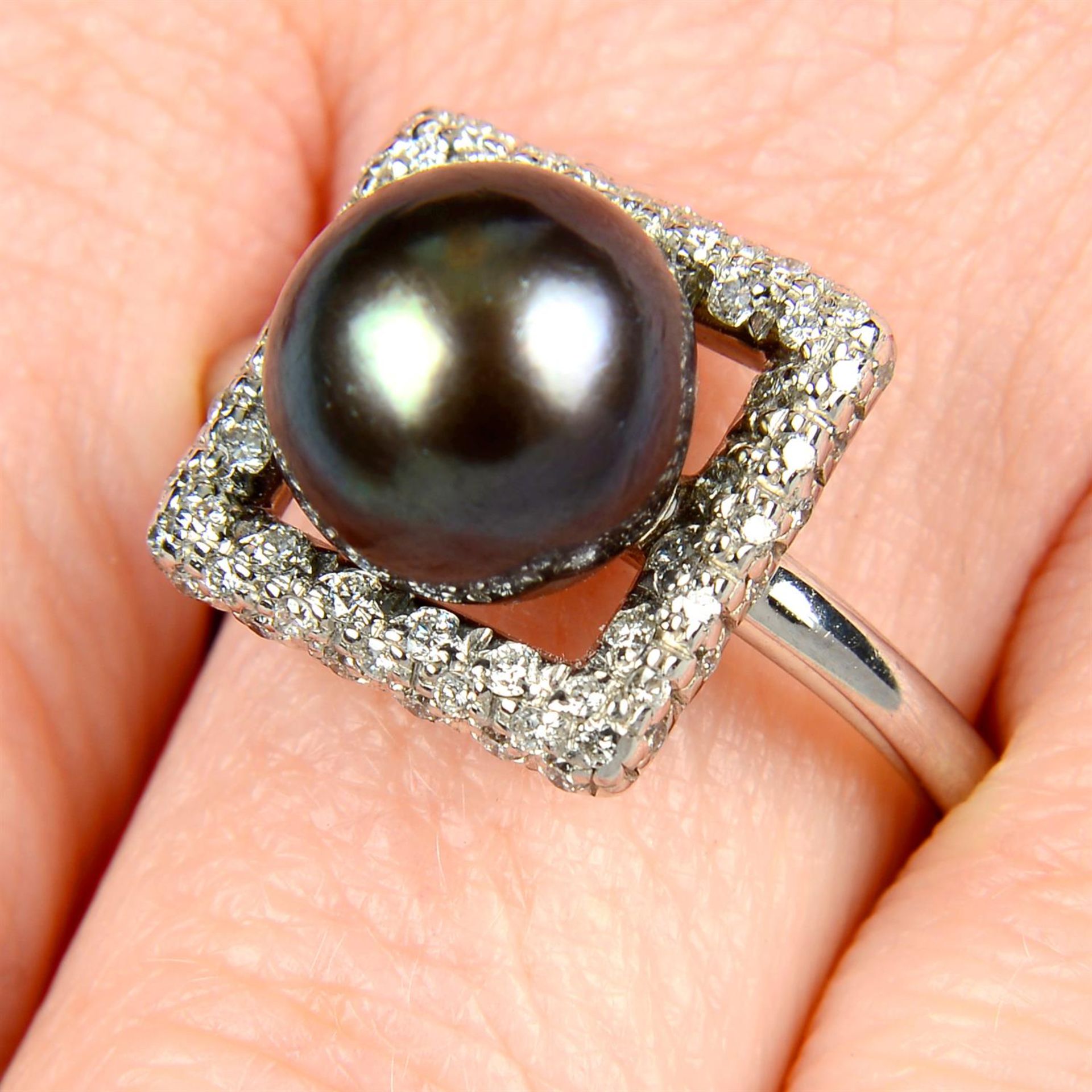 An 18ct gold 'Tahitian' cultured pearl and diamond ring, by Mikimoto.