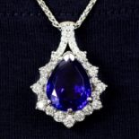 An 18ct gold tanzanite and brilliant-cut diamond pendant, on chain.