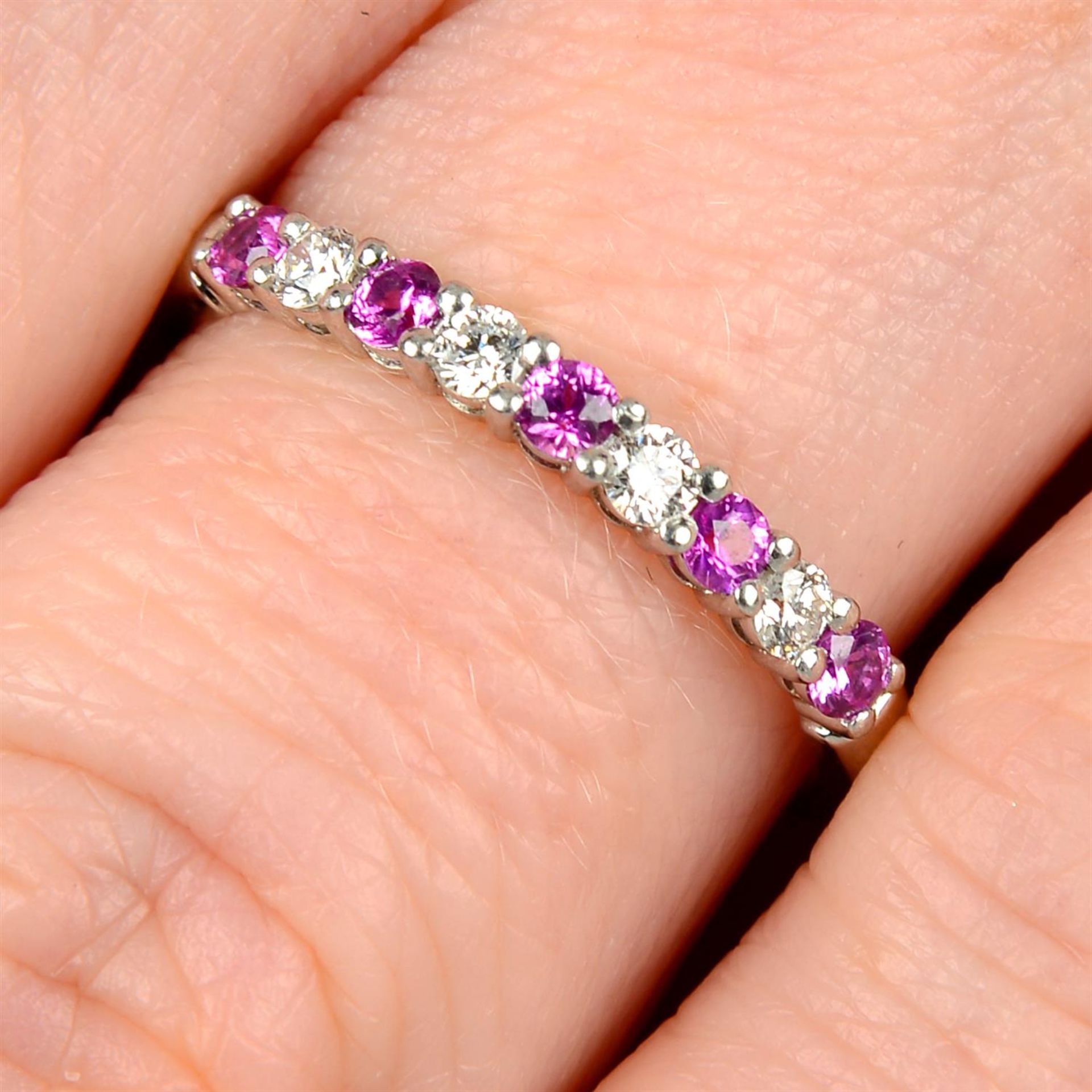 A platinum pink sapphire and brilliant-cut diamond band ring, by Tiffany & Co.