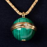A malachite and diamond 'Posession' pendant, on chain, by Piaget.