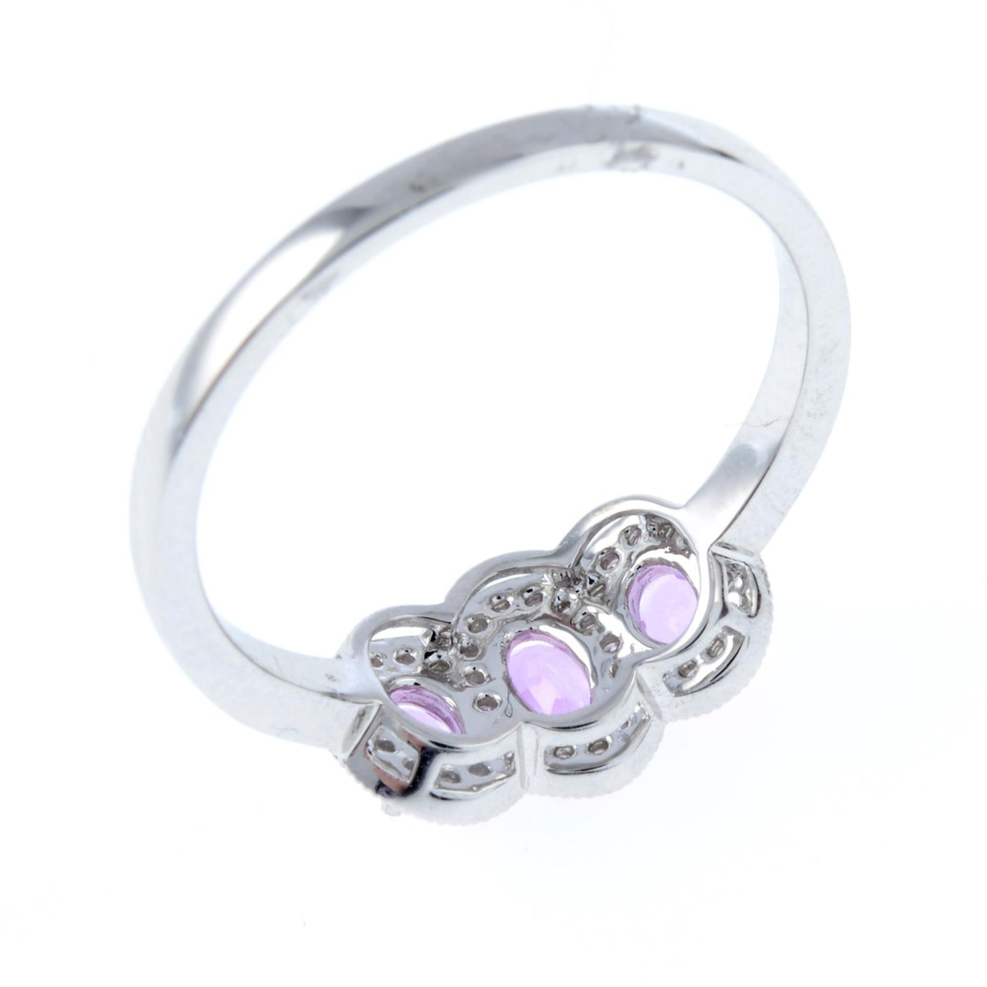 An 18ct gold pink sapphire and diamond triple cluster ring. - Image 2 of 2