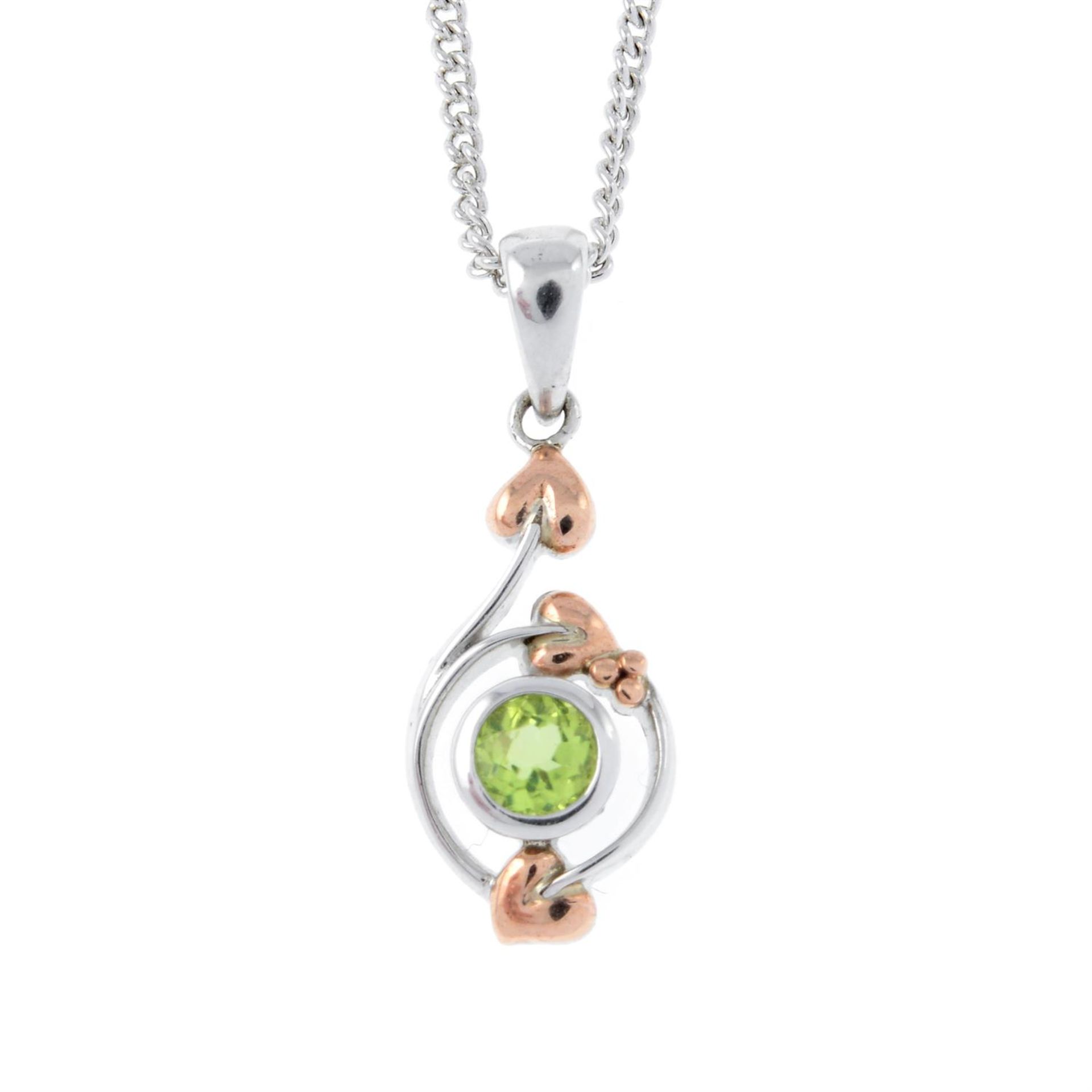 A silver peridot openwork pendant, with chain, by Clogau.