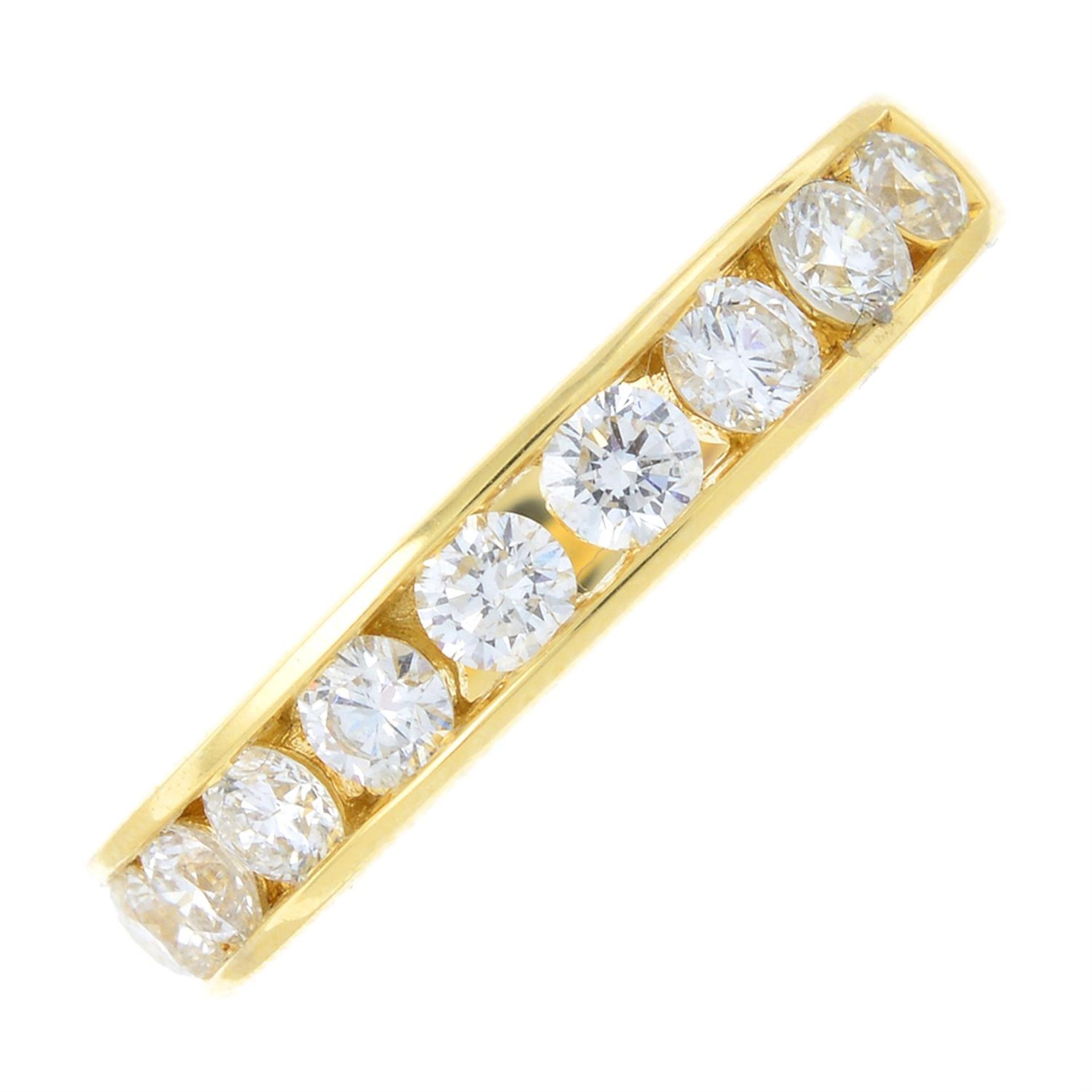 An 18ct gold brilliant-cut diamond half eternity ring.