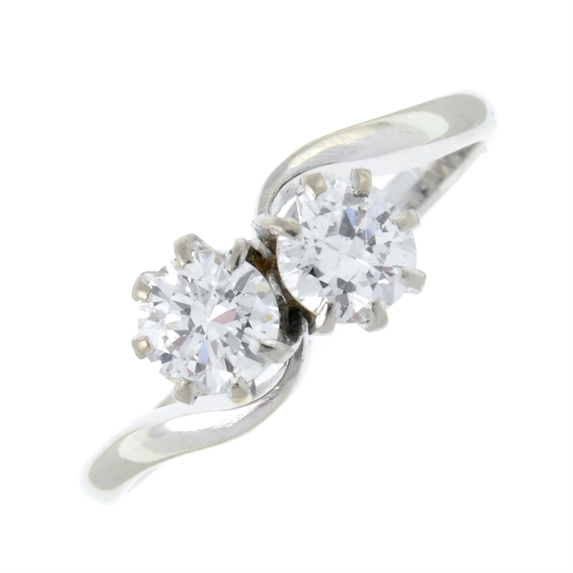 A mid 20th century 18ct gold brilliant-cut diamond crossover ring.