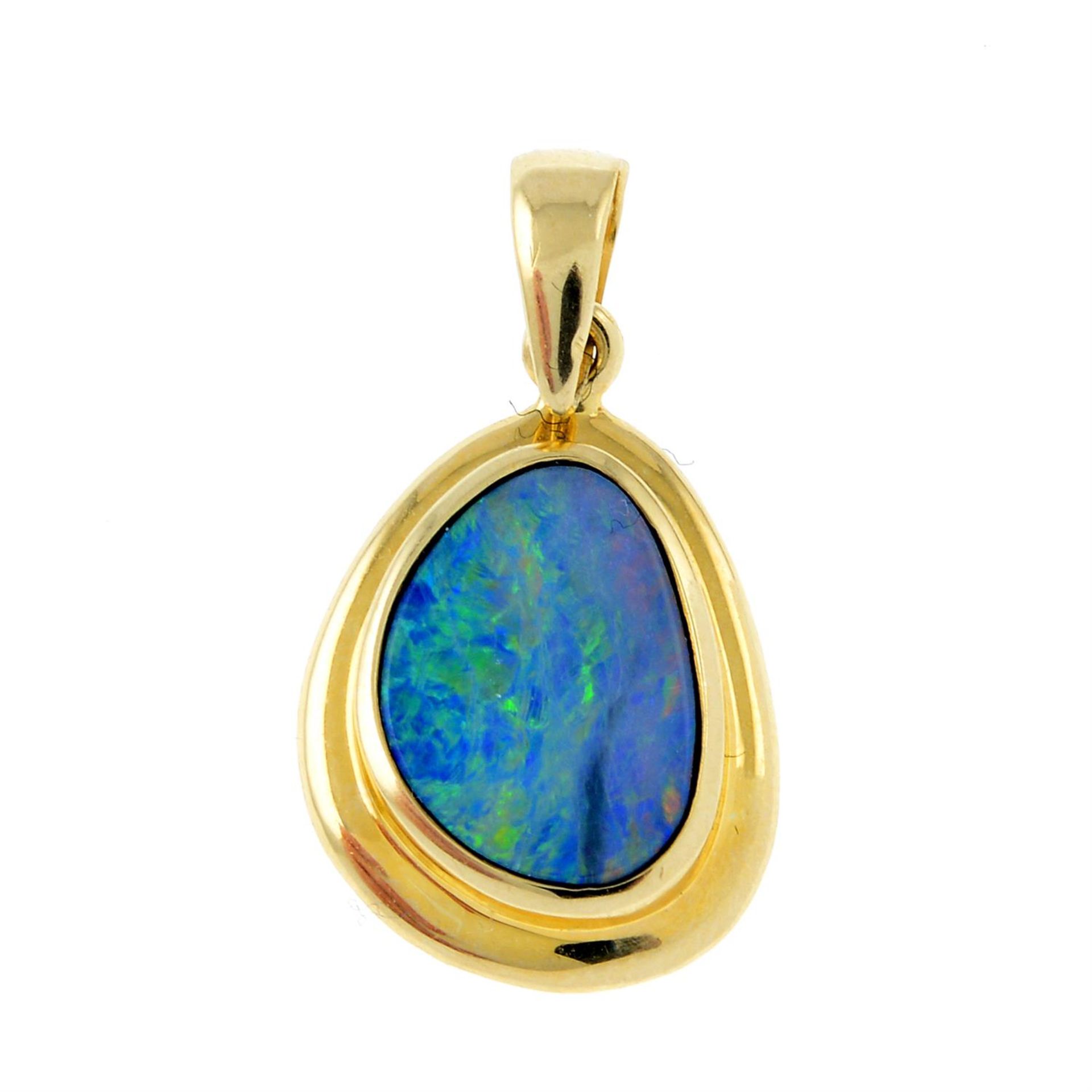 A fancy-shape opal doublet pendant.