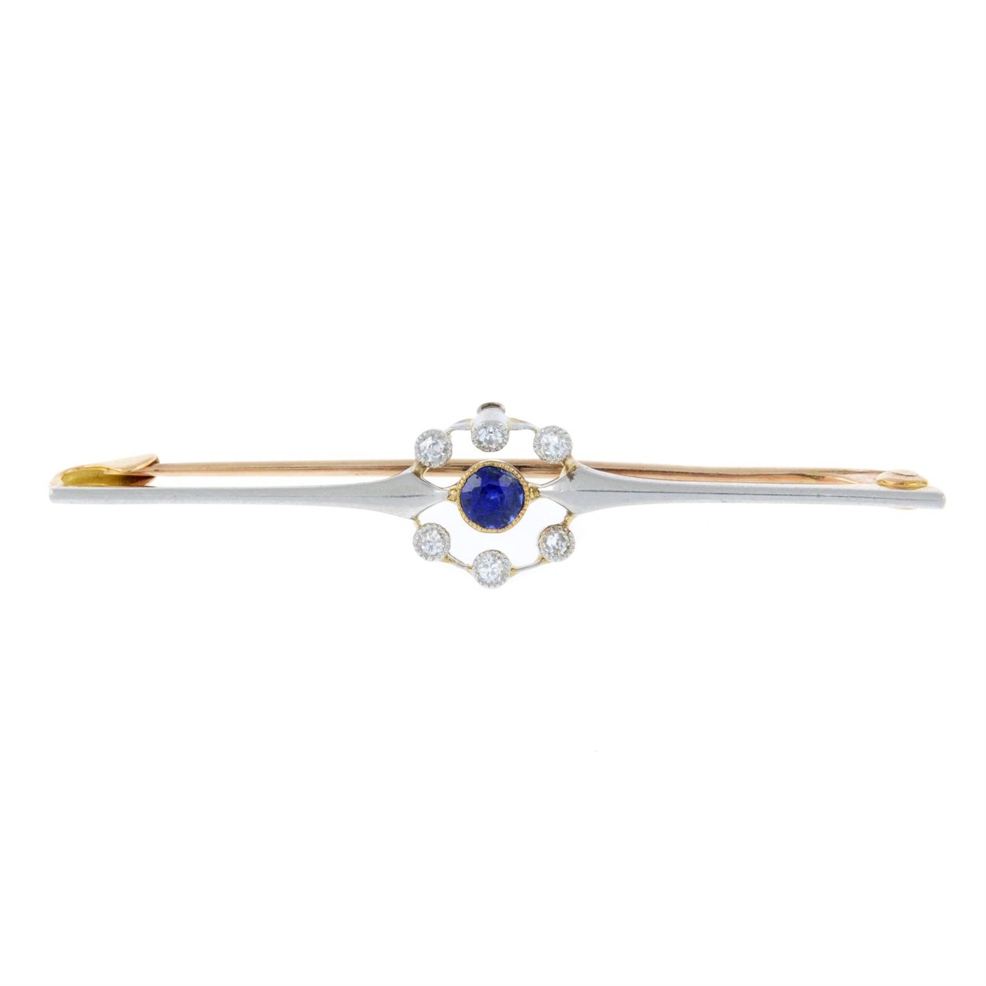 An early 20th platinum and gold, sapphire and diamond bar brooch.