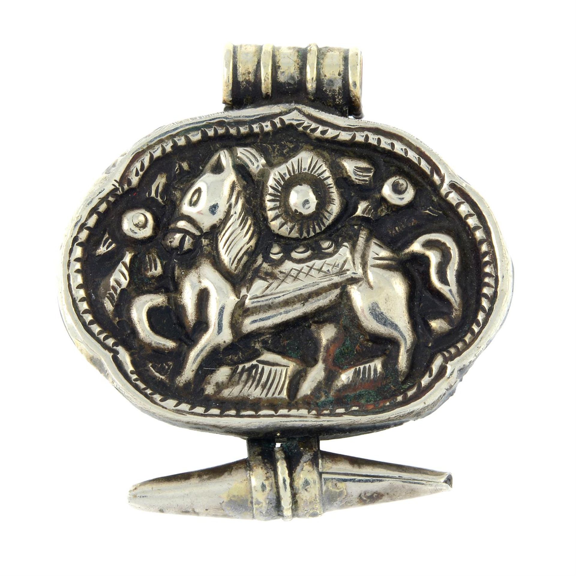 A 19th century silver horse pendant.