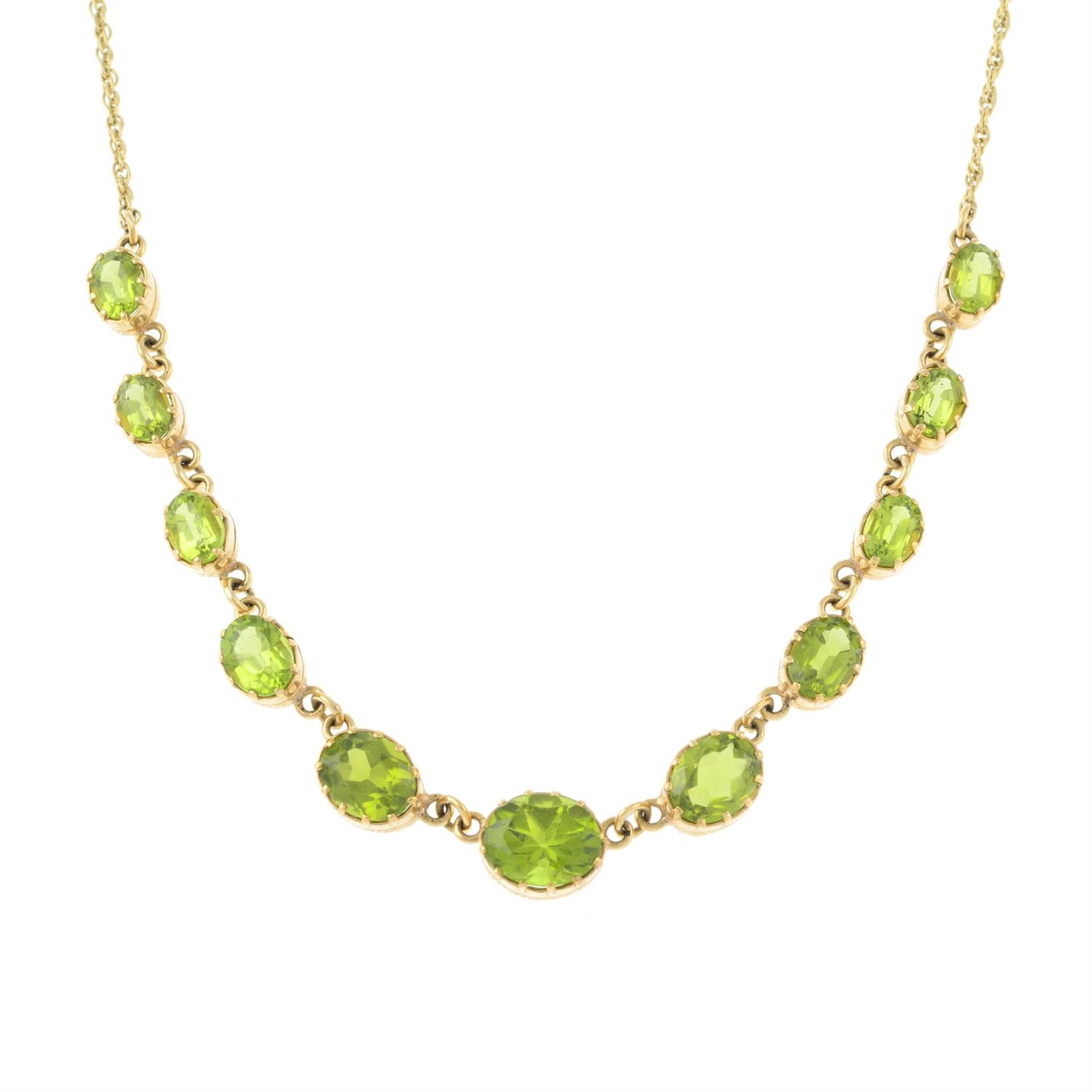 A 9ct gold peridot rivière necklace.