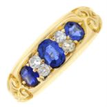 An early 20th century 18ct gold sapphire three-stone ring, with old-cut diamond spacers.