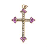 An early 20th century 9ct gold ruby and seed pearl cross pendant.