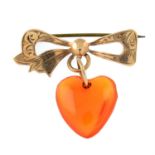 A late Victorian 9ct gold bow brooch, with carnelian heart drop.