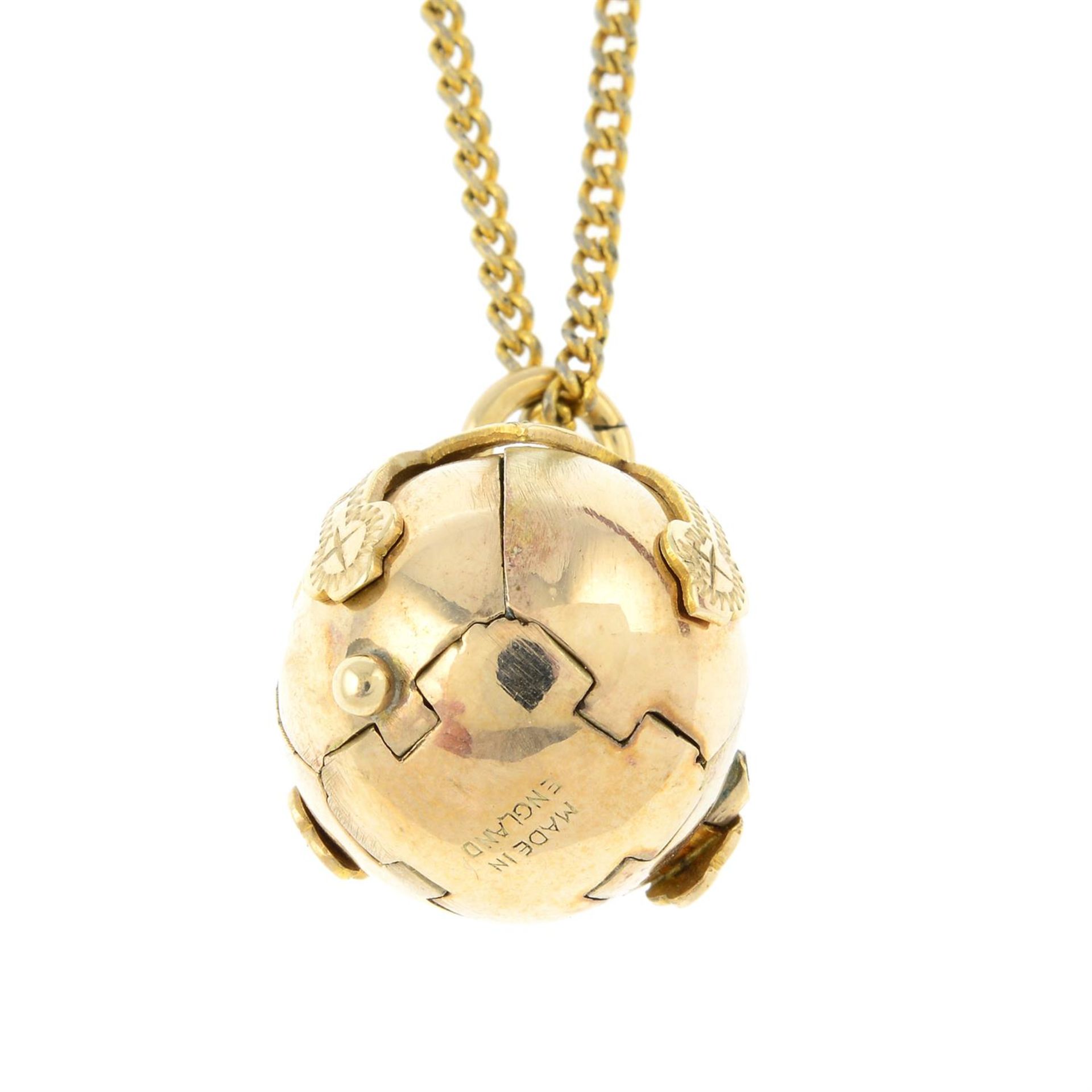 A Masonic ball pendant, with chain.