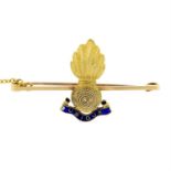 An early 20th century 15ct gold Royal Engineers regimental brooch, with enamel banner.