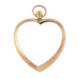 An early 20th century 9ct gold heart double sided locket.