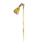 An early 20th century gold ruby and rose-cut diamond bell stickpin.