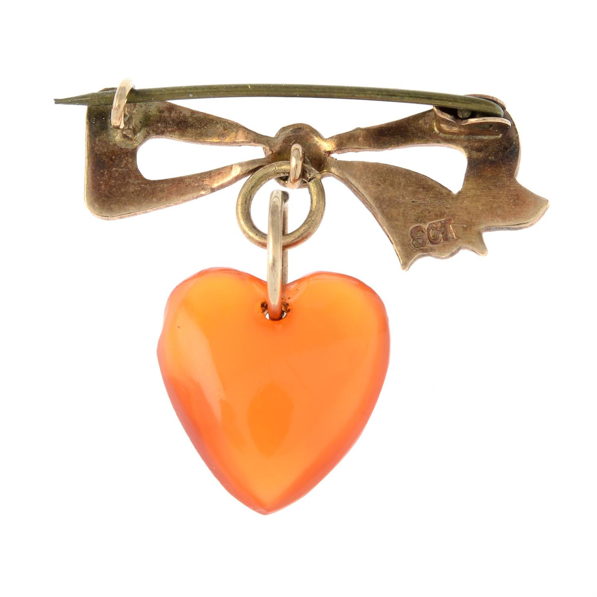 A late Victorian 9ct gold bow brooch, with carnelian heart drop. - Image 2 of 2