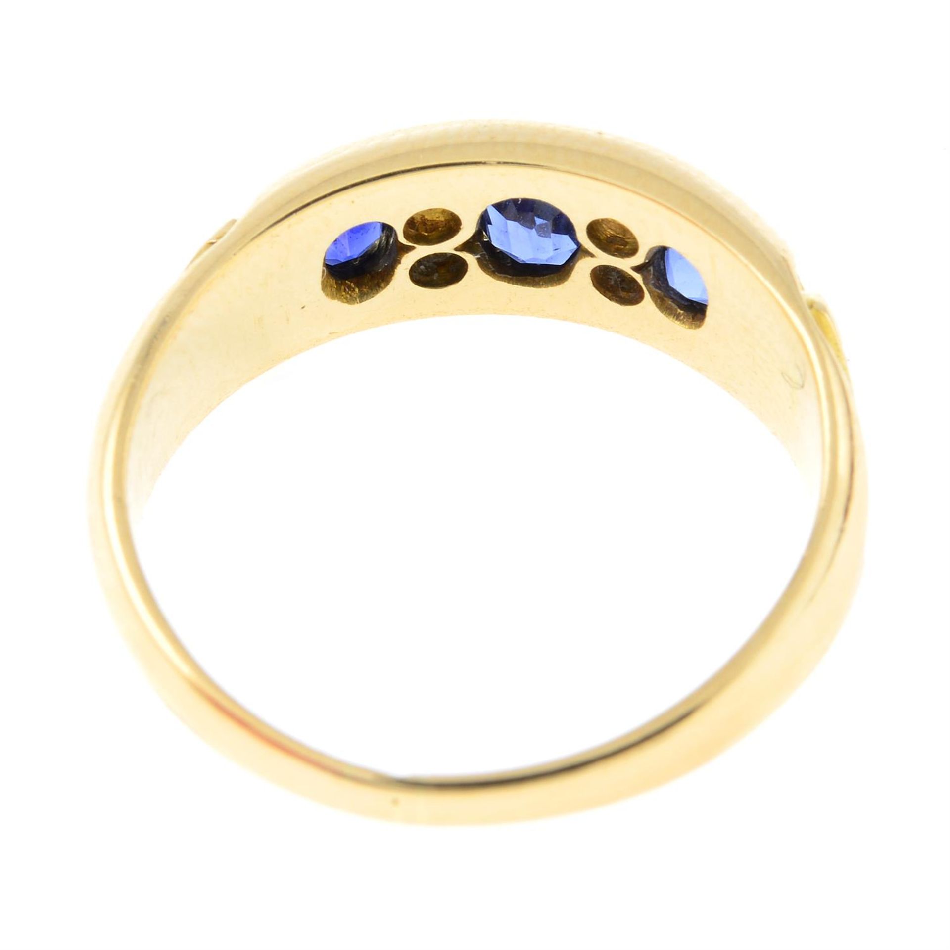 An early 20th century 18ct gold sapphire three-stone ring, with old-cut diamond spacers. - Image 2 of 2