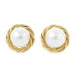 A pair of 9ct gold cultured pearl stud earrings.