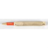 An S Mordan & Co 9ct gold cased telescopic propelling pencil.