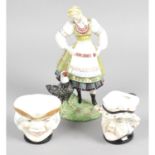 An assortment of items to include a Beswick character jugs and a Wedgwood figurine.