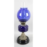 A Victorian oil lamp.