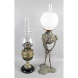 Two Victorian oil lamps.