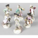 A group of six porcelain monkey band figurines with Meissen style marks.