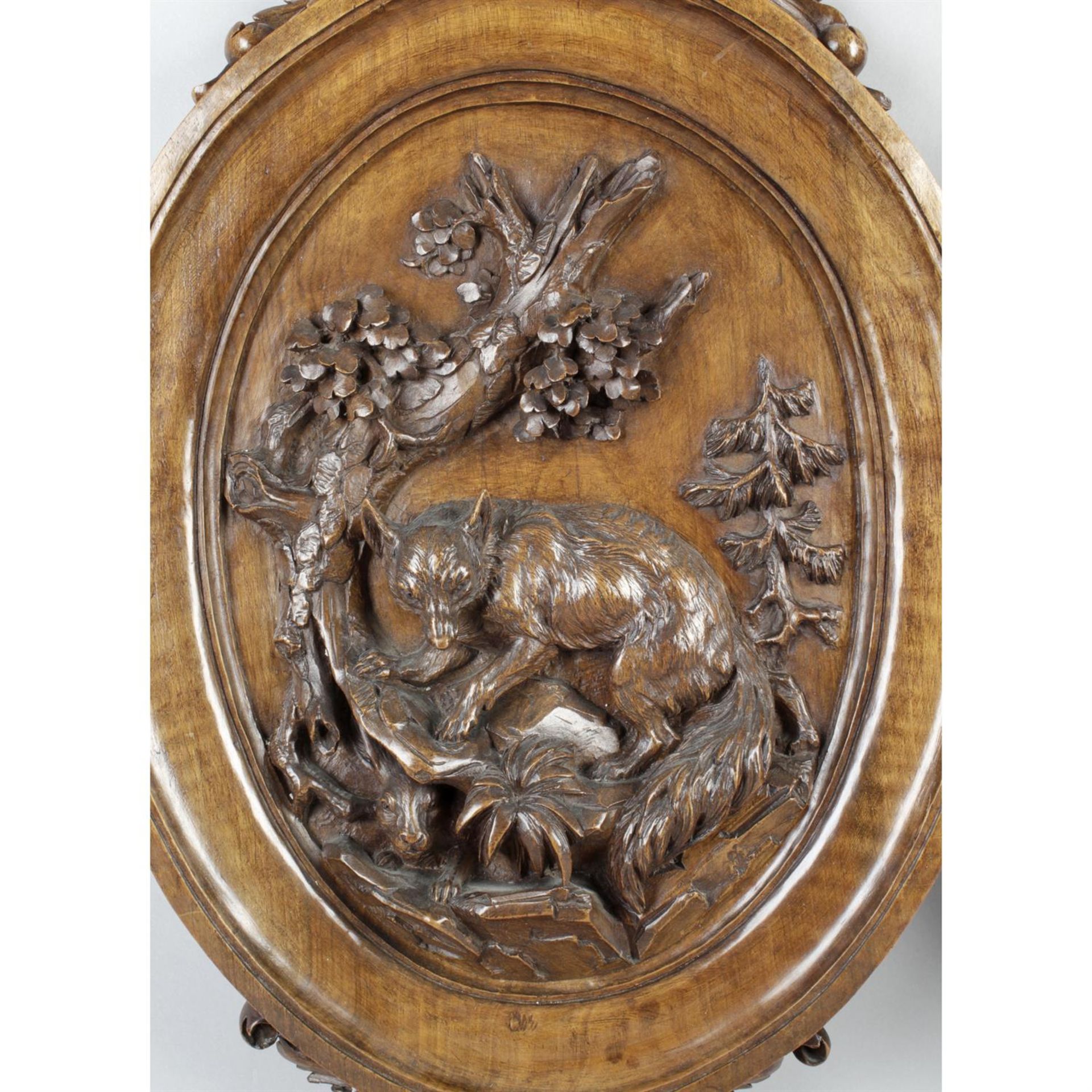 A pair of late 19th century Black Forest carved wooden wall plaques. - Image 2 of 4