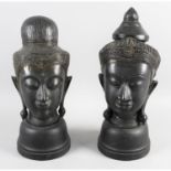 A Chinese cast gilt bronze figure, with another bronze figure and two Eastern cast metal heads.