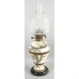 A Victorian oil lamp.