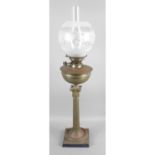 A Victorian oil lamp.