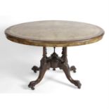 A large 19th century walnut veneered oval topped table.