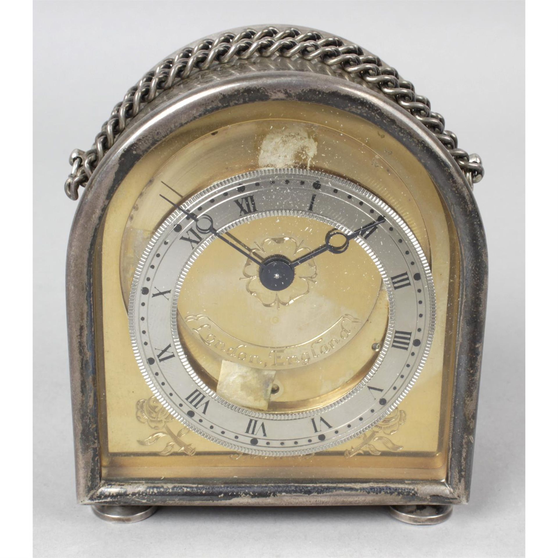 A silver cased carriage clock.