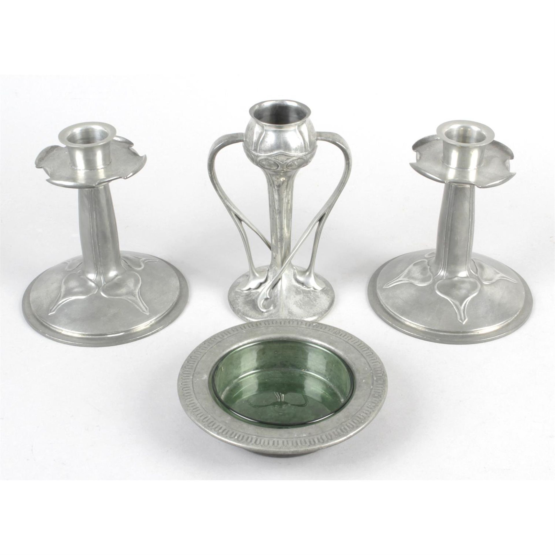 A pair of 'Tudric' Solkets pewter candle sticks.