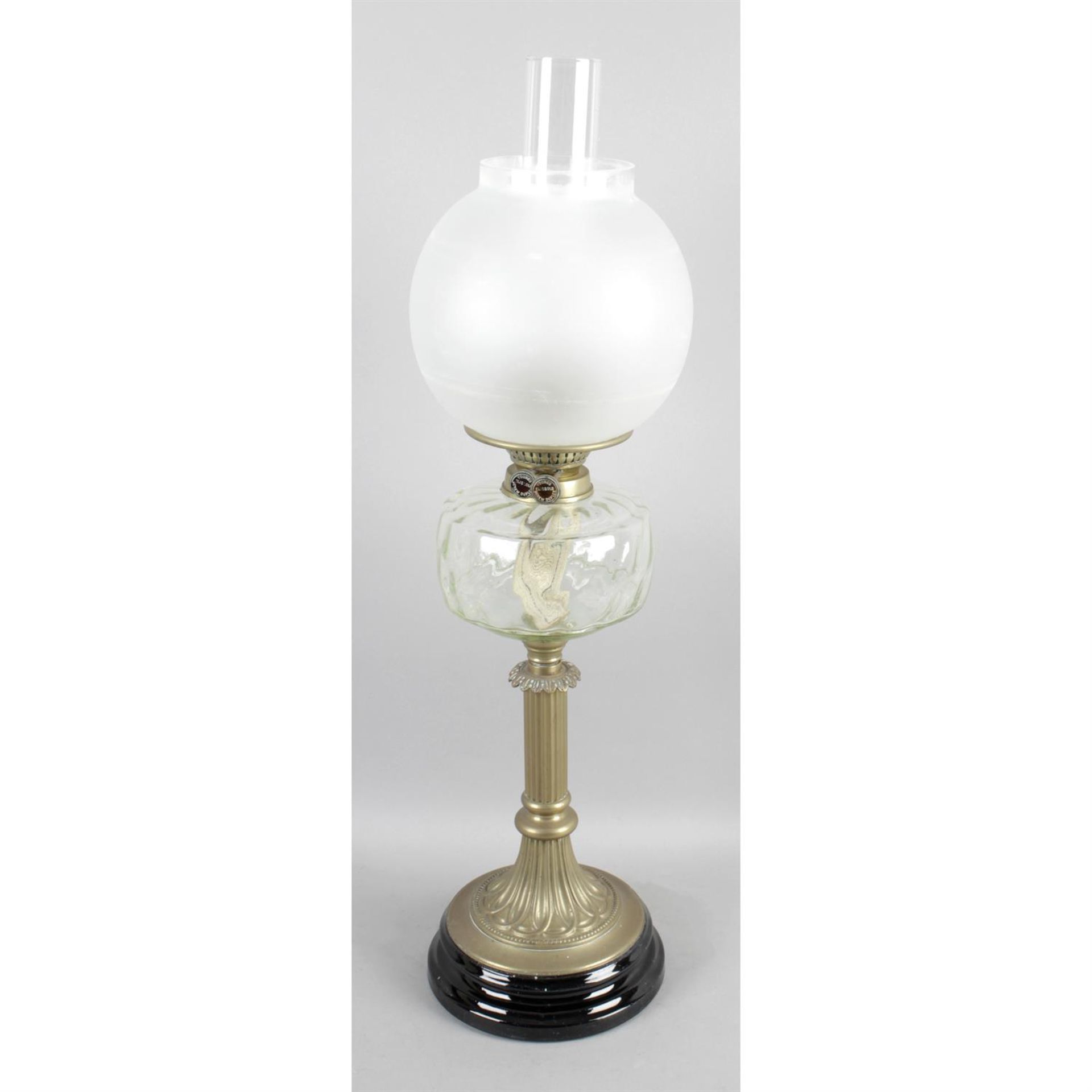 A Victorian oil lamp.