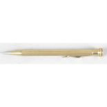 A 'lifelong' 9ct gold cased propelling pencil.