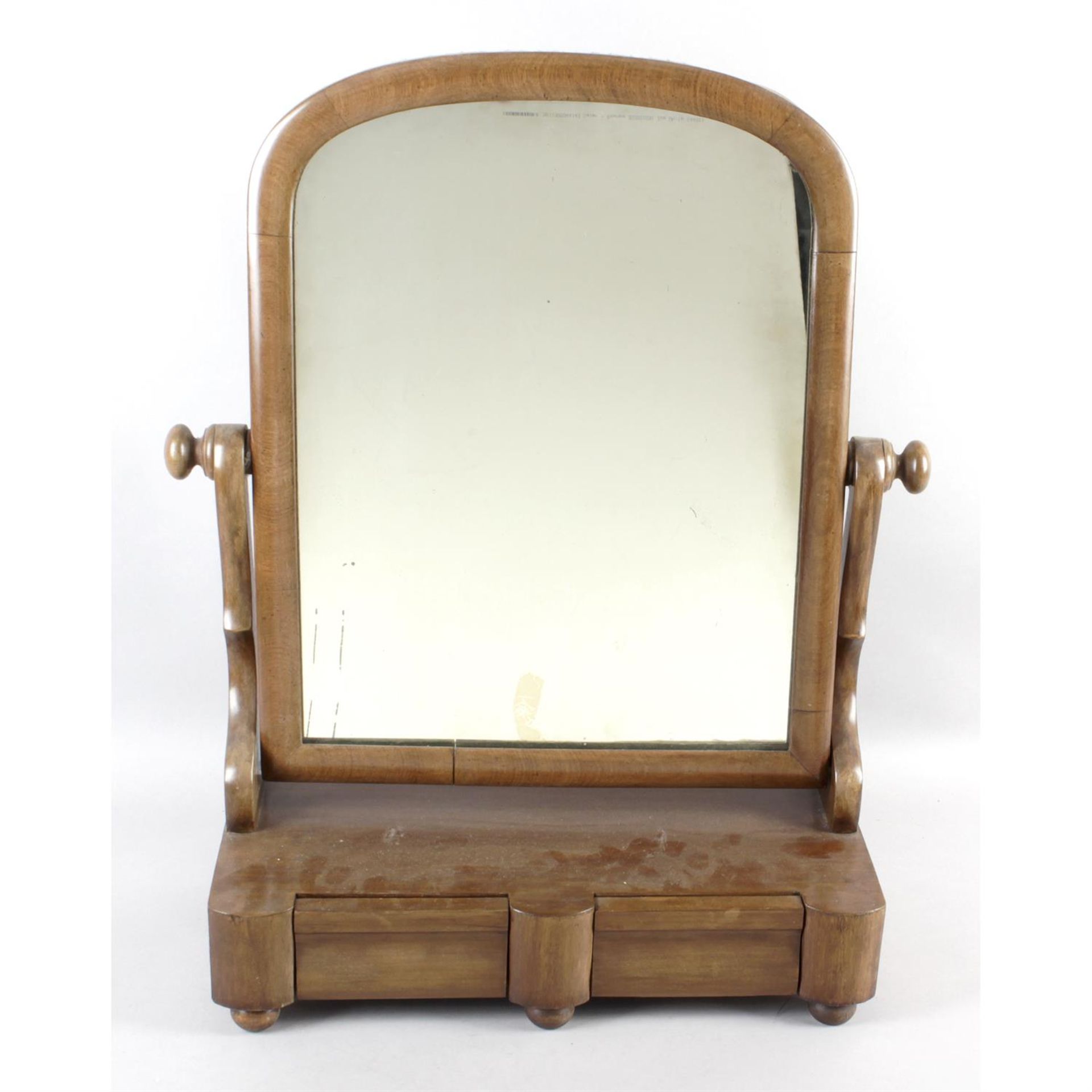 A 19th century mahogany framed swing toilet mirror.