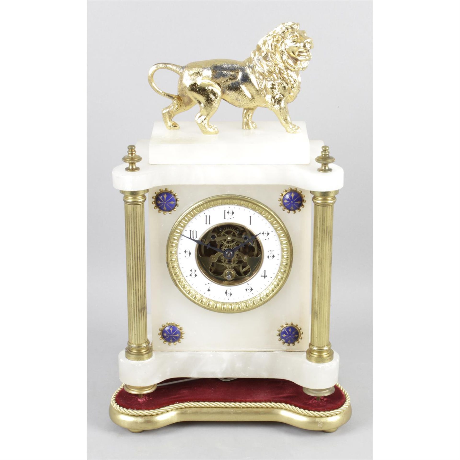 A 19th century alabaster and gilt metal cased mantel clock.