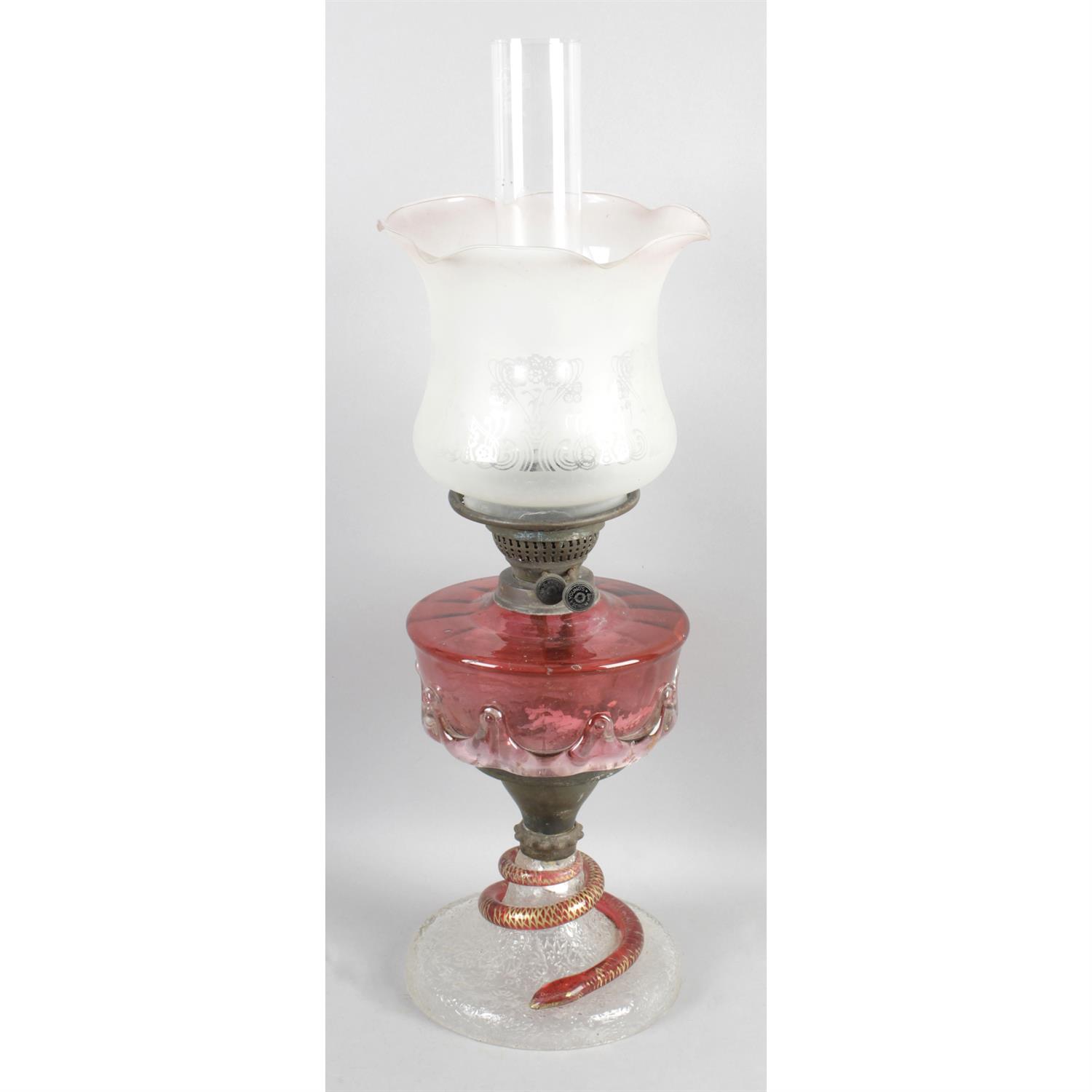 A Victorian oil lamp.